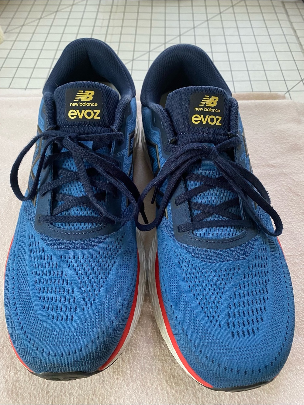 New Balance EvoZ Men's Blue and Navy Athletic Running Shoes with Red Accent